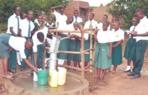 students-at-borehole-St.-Matia-Mulumba