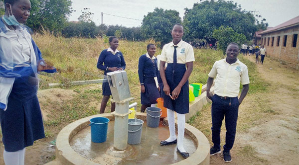 students at borehole