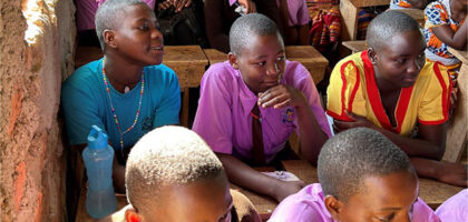 Saint Denis Secondary School student in a classroom.