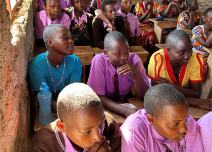 Saint Denis Secondary School student in a classroom.